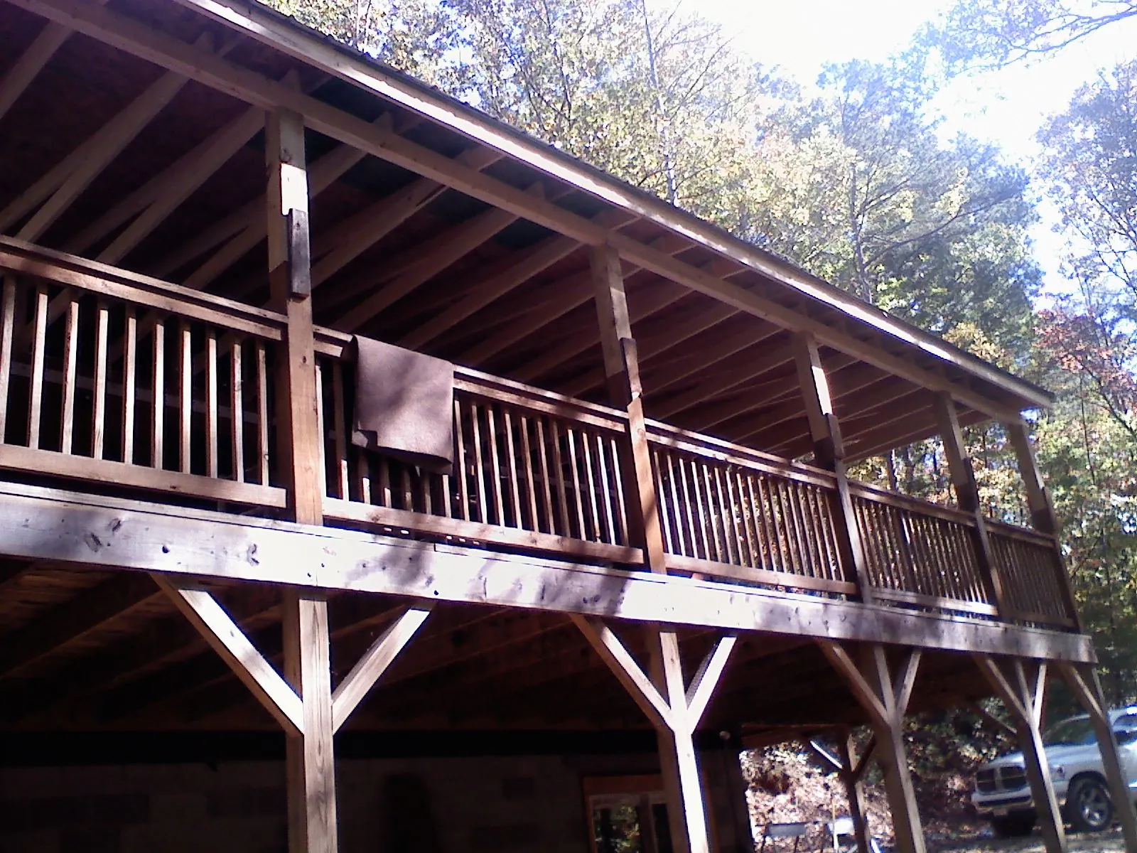 Timber framing under a new elevated porch and deck — Roof Leak Repair in Friendsville by Roofing Brothers